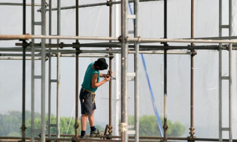 Man working on scaffolding