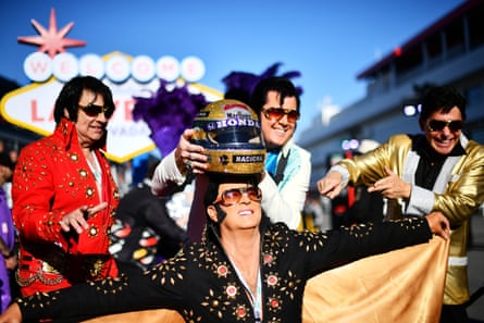 Elvis Presley impersonators pose for a photo in the paddock prior to practice before the F1 Grand Prix of Las Vegas.