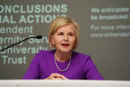 Midwife Donna Ockenden behind a desk at a press conference
