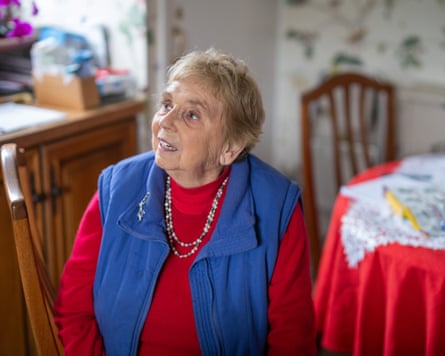 Linda Williams sitting on a dining chair