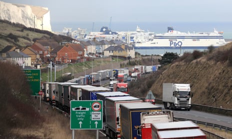 Lorries queue to enter the port of Dover as French customs officers carry out industrial action to protest about pay and to show the effect Brexit will have on cross-Channel passengers