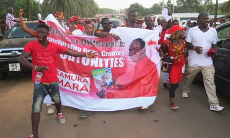 Supporters of Sierra Leone presidential candidate Samura Kamara, the foreign affairs minister, celebrate his selection by Ernest Bai Koroma in the streets of Makeni