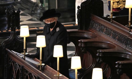 The Queen sits alone at the funeral of her husband, the Duke of Edinburgh, in St George's Chapel, Windsor Castle, in Berkshire. 