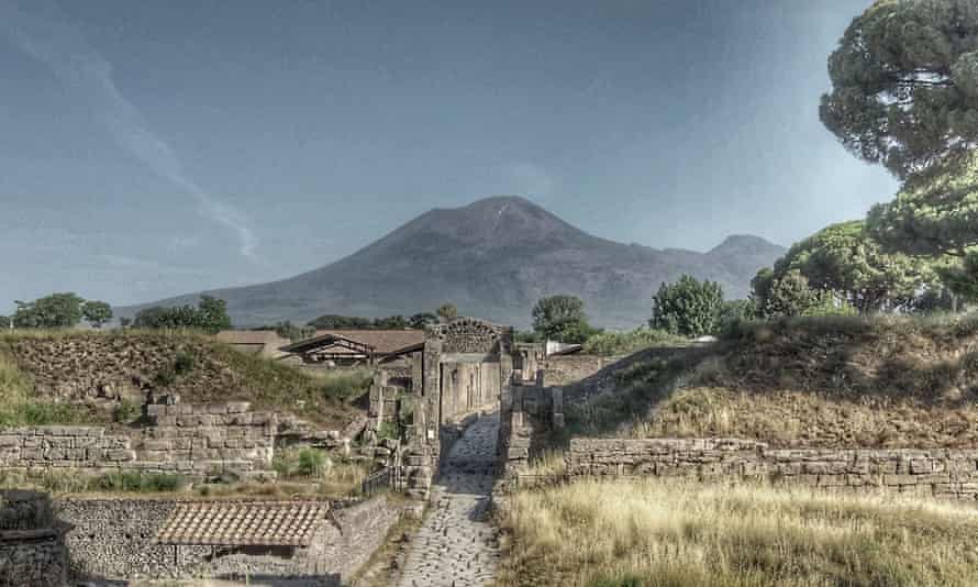 Pompeii with Mount Vesuvius looming over it.
