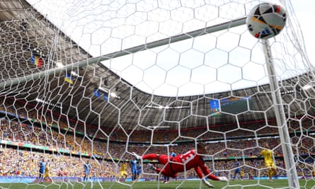 Nicolae Stanciu scores his stunning opener for Romania