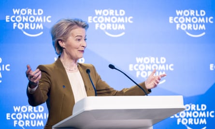 Ursula von der Leyen speaks at lectern with World Economic Forum logos behind
