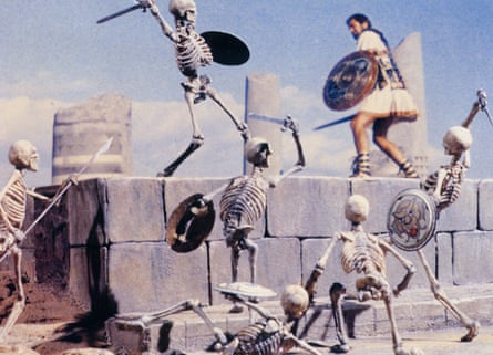 Skeleton warriors with swords and round shields attack one of the Argonauts