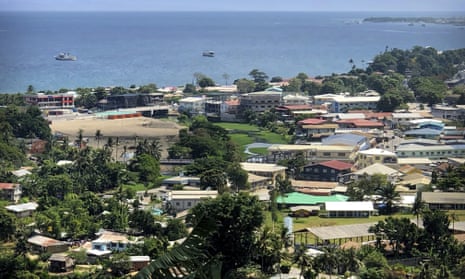 Ships are docked offshore in Honiara, the Solomon Islands capital