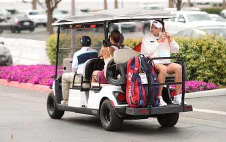 Aryna Sabalenka and Elena Rybakina head to court on a golf buggy before the final of the BNP Paribas Open in March 2023 in Indian Wells