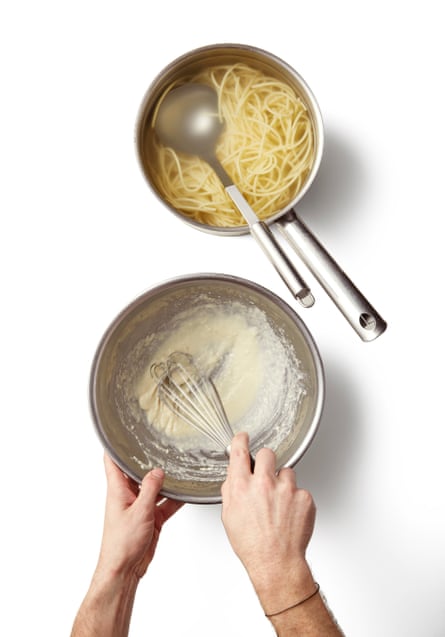 Once the pasta is almost ready, scoop out a ladleful of the cooking water. Put the grated cheese in a heatproof bowl, then gradually whisk in just enough of the hot water to make a smooth, bechamel-like paste.