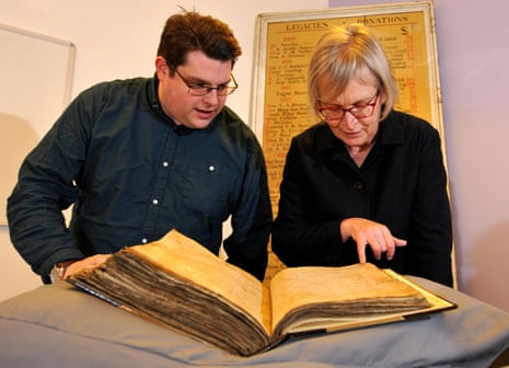 Gary Brannan and Sarah Rees Jones examine one of the archishops’ registers.