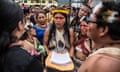 Waorani leader Nemonte Nenquimo, carries her people’s lawsuit in her hands during a march towards the Provincial courthouse in Puyo, Pastaza, Ecuadorian Amazon.
