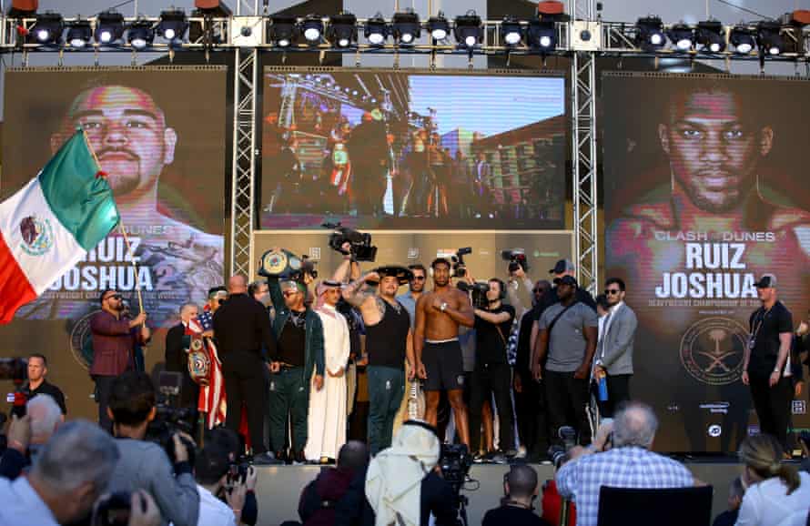 Andy Ruiz Jr and Anthony Joshua pose for photos after weighing in ahead of their fight in Riyadh in 2019.