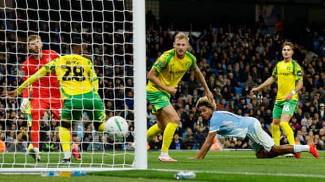 Floyd Samba stoops th had City into the lead.