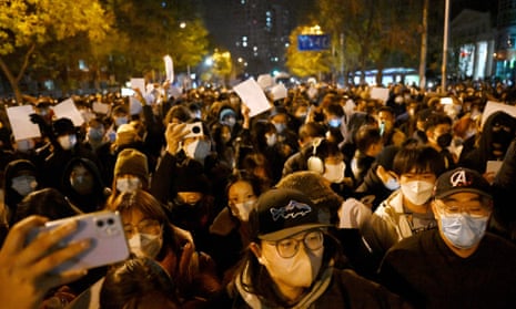 Protesters at a rally in Beijing last week to commemorate the victims of a deadly fire and to protest against China’s harsh Covid rules