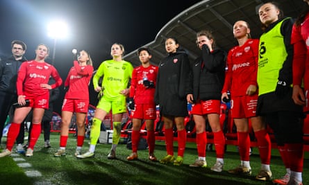Dijon huddle up after a 2-1 win against Reims in February