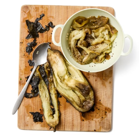 Felicity Cloake’s baba ganoush 04a. 4 Remove the flesh Slit open the aubergines lengthways, then scoop out the long strands of soft flesh from the inside; discard the skins. Put the flesh in a sieve and, ideally, leave it to drain over the sink or a bowl for about 30 minutes, because that will give you a chunkier, more full-flavoured result. Alternatively, squeeze the flesh over the sieve to get rid of any excess water.