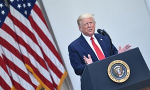 Donald Trump answers questions from reporters at the White House on Tuesday.