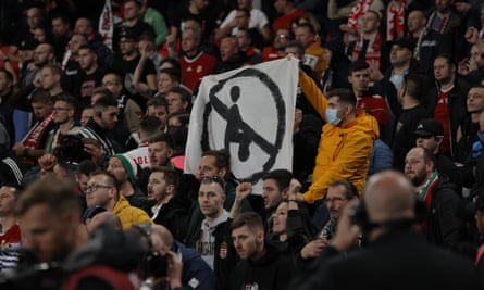 Hungary fans hold up an anti-kneeling banner during the 2022 World Cup qualifier at Wembley.