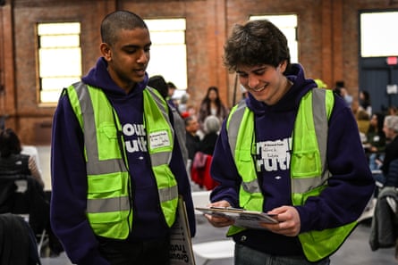 men holding clipboards