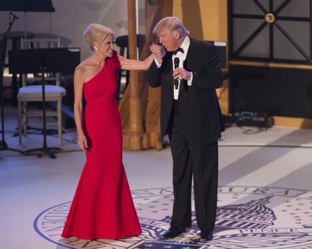 Donald Trump kisses the hand of his campaign manager Kellyanne Conway at a ‘Candlelight’ dinner to thank donors in Washington DC.