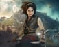 A fierce woman warrior holds two curved knives, surrounded by ancient ruins and soldiers