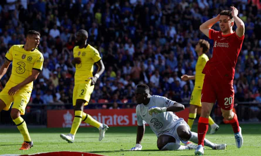 Diogo Jota of Liverpool reacts after volleying over the bar.