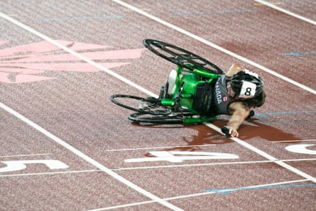 Jessica Frotten of Canada after she crashed during the women’s T54 1500m final.