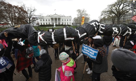 Indigenous leaders protest against the Dakota Access and Keystone XL pipelines in front of the White House in March 2017