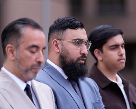 Muhammad Amaad with two other men outside Liverpool crown court