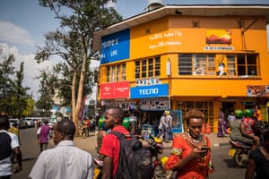People go about their business in Kigali, Rwanda.