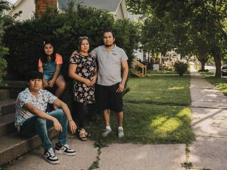 Efren “Freddy” Herrera stands with his wife Susana, and children Freddy, 15, and Zoe, 8 at their home in Monroe, Wisconsin. Herrera immigrated from Mexico when he was 14.