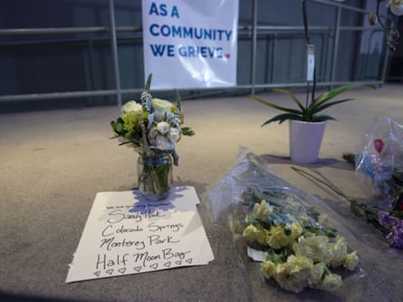 Flowers are placed to mourn victims of the shootings in Half Moon Bay in California on Tuesday.