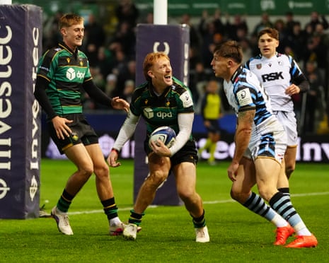 George Hendy celebrates after touching down to score for Northampton