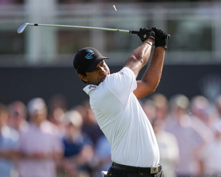 Aaron Rai plays a tee shot