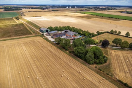 Aerial shot of the dried up wheat fields and farm buildings