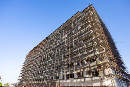 Scaffolding around an apartment building being constructed