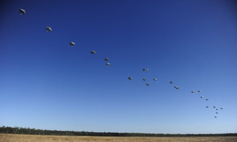 US paratroopers from the 4/25th Infantry Division make a jump from a C-17 Globemaster as part of exercise Talisman Sabre on 8 July, 2015 in Rockhampton, Australia. 