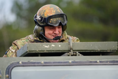 Ben Wallace in an Ajax armoured personnel carrier during a visit to Bovington Camp yesterday.