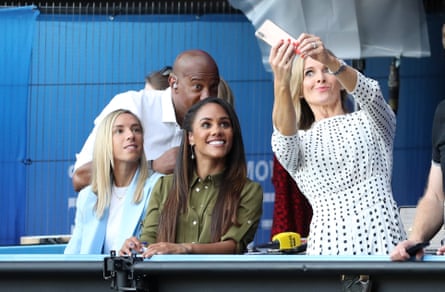 BBC presenters Gabby Logan, Alex Scott, Jordan Nobbs and Dion Dublin pose for a selfie during the Quarter Final match between Norway and England at Stade Oceane.