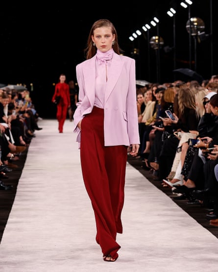 A model walks down the catwalk wearing an outfit by designer Carla Zampatti