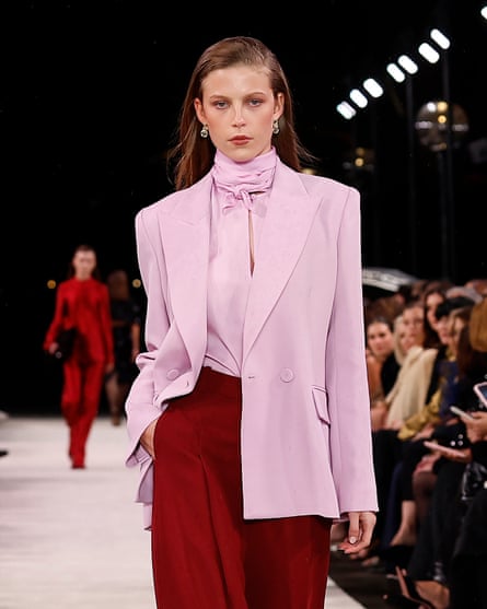 A model walks down the catwalk wearing an outfit by designer Carla Zampatti