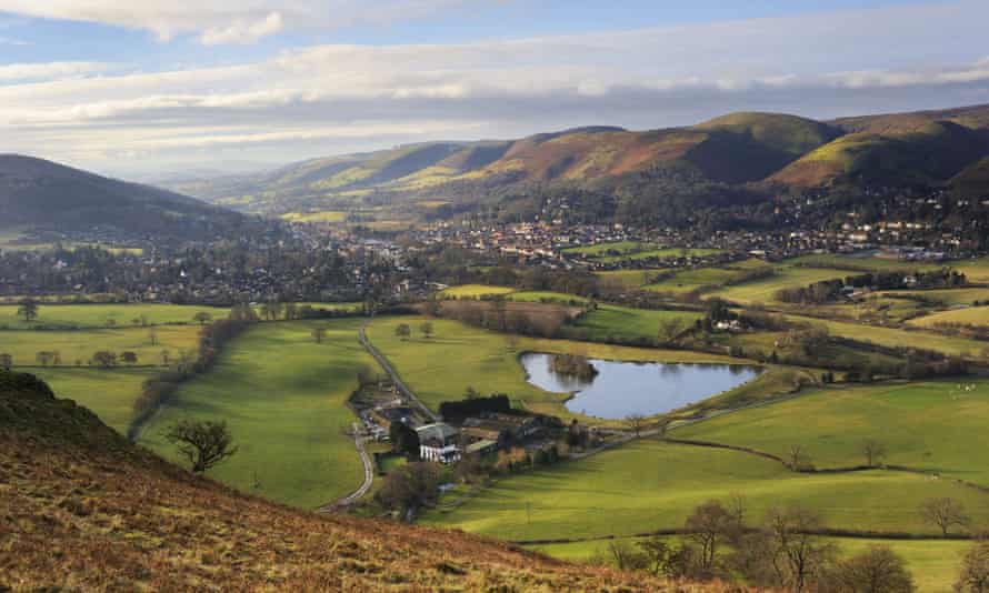 View of the town of Church Stretton and The Long Mynd hills from Caer Caradoc, Shropshire, UK.