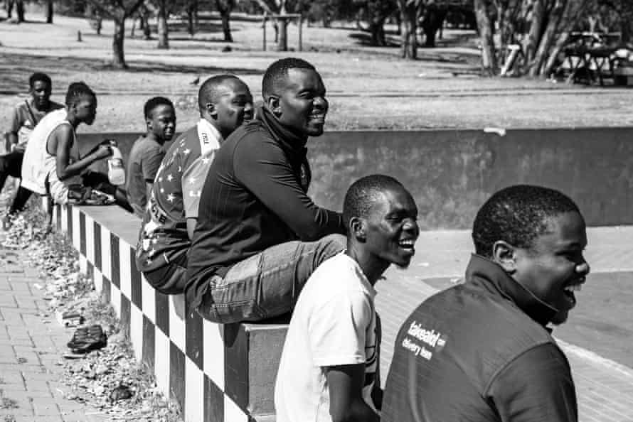 Ghost riders: the invisible lives of Johannesburg food couriers – photo essay | South Africa 29 Riders like to hang out and play football together on public holidays