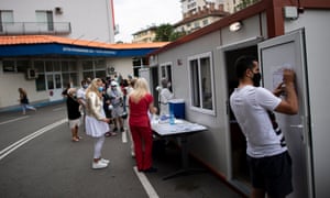 People wait in line to be tested for COVID-19 at Pirogov hospital in Sofia, Bulgaria.