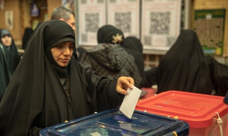 Woman casts vote