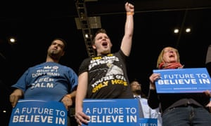 Members
      of the audience during a campaign rally for Bernie Sanders in
      Minneapolis, 29 February 2016.