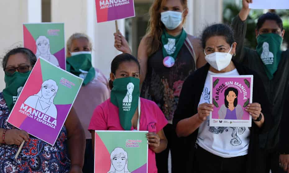 Women demonstrate at a screening of a hearing of the Inter-American Court of Human Rights in San Salvador, on 10 March 2021.