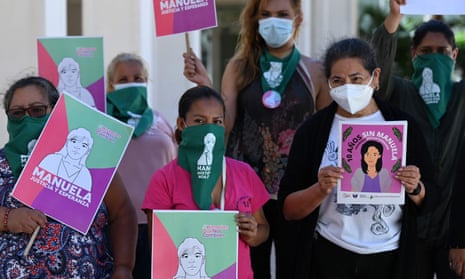 Women demonstrate at a screening of a hearing of the Inter-American Court of Human Rights in San Salvador, on 10 March 2021.
