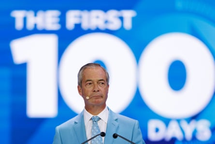 Nigel Farage on stage on the third day of Reform UK conference at NEC in Birmingham